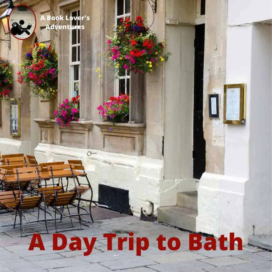 White building with colorful flowers and wording: A Day Trip to Bath