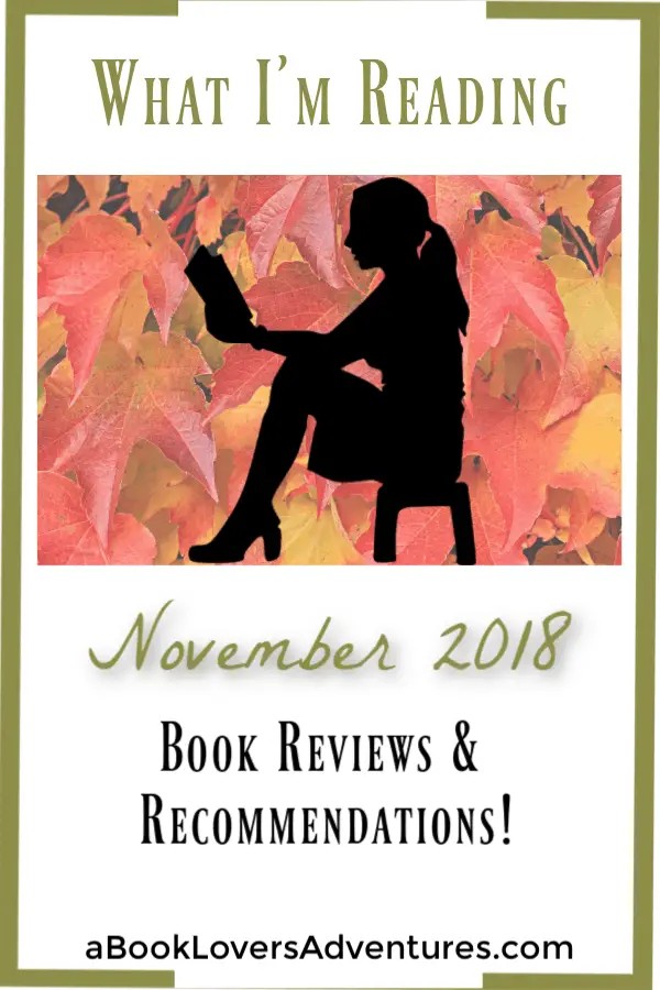 What I'm Reading November; black silhouette of woman reading with fall leaves as background