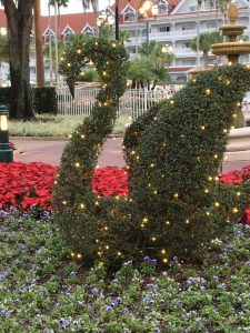 swan covered with white lights at the Grand Floridian