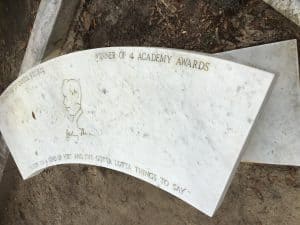 Conrad Aiken's bench shaped tombstone at Bonaventure Cemetery