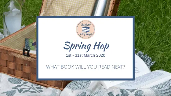 picnic basket with books inside on a blanket; overlay with words: Spring Hop 1st - 31st March 2020  What book will you read next?