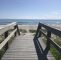 wooden boardwalk heading to Melbourne beach in Florida